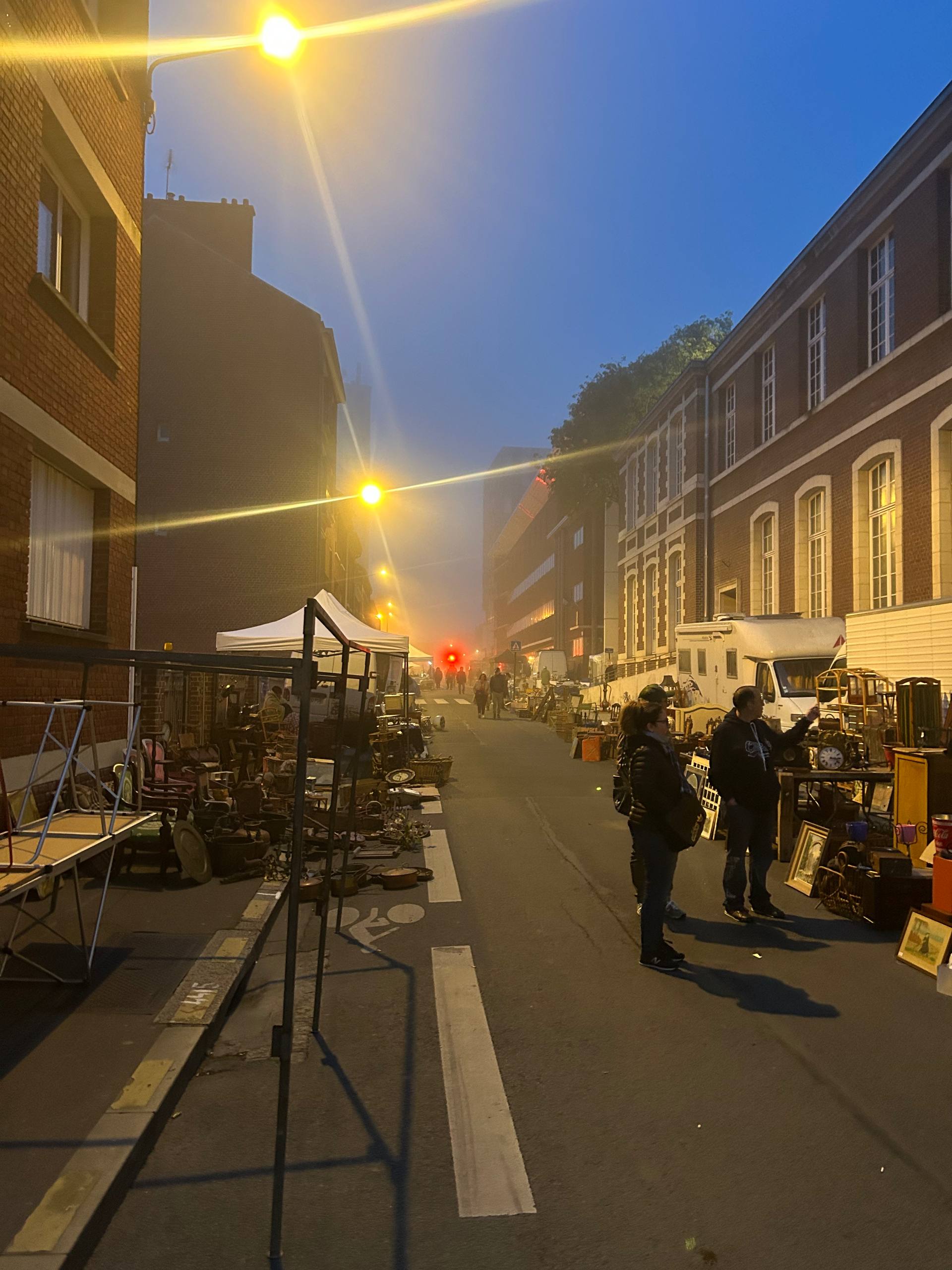 Night-time brocante street market in Amiens, France — UK reseller sourcing trip