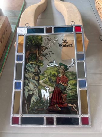 Leaded stained-glass panel depicting Saint Hubert kneeling before a stag