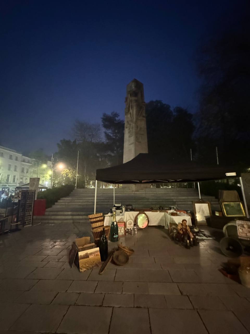 French brocante night market scene with vintage stalls — UK reseller sourcing trip