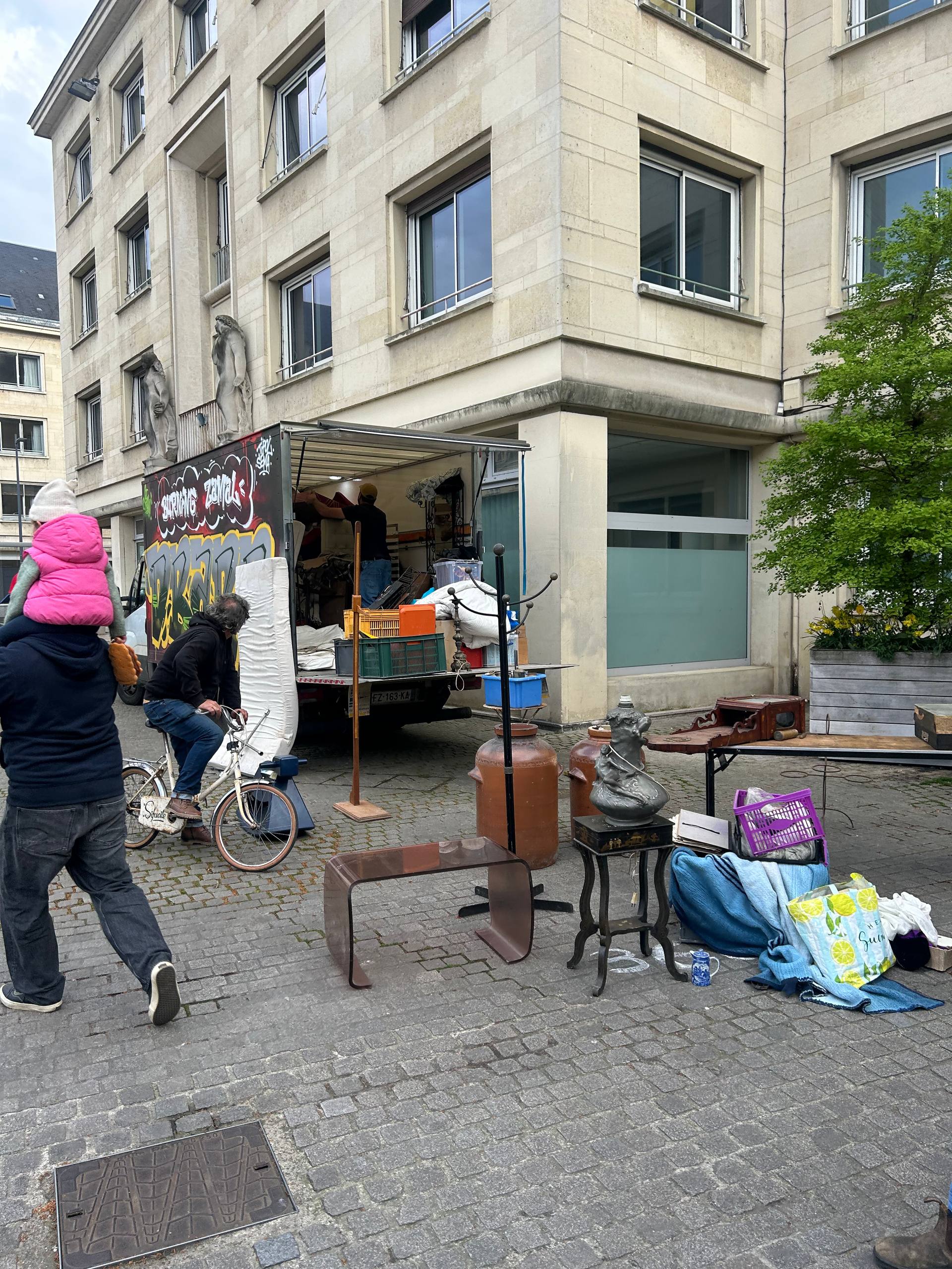 French street brocante event with vintage stalls — UK reseller sourcing photo