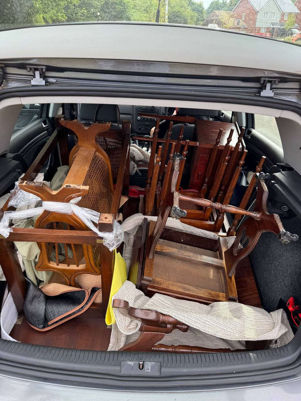 UK reseller's car loaded after a UK antiques fair — typical Newark or Ardingly trade-day haul