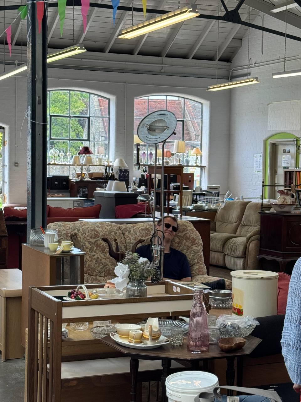Oleksandr Prudnikov in a French vintage shop after a long sourcing day