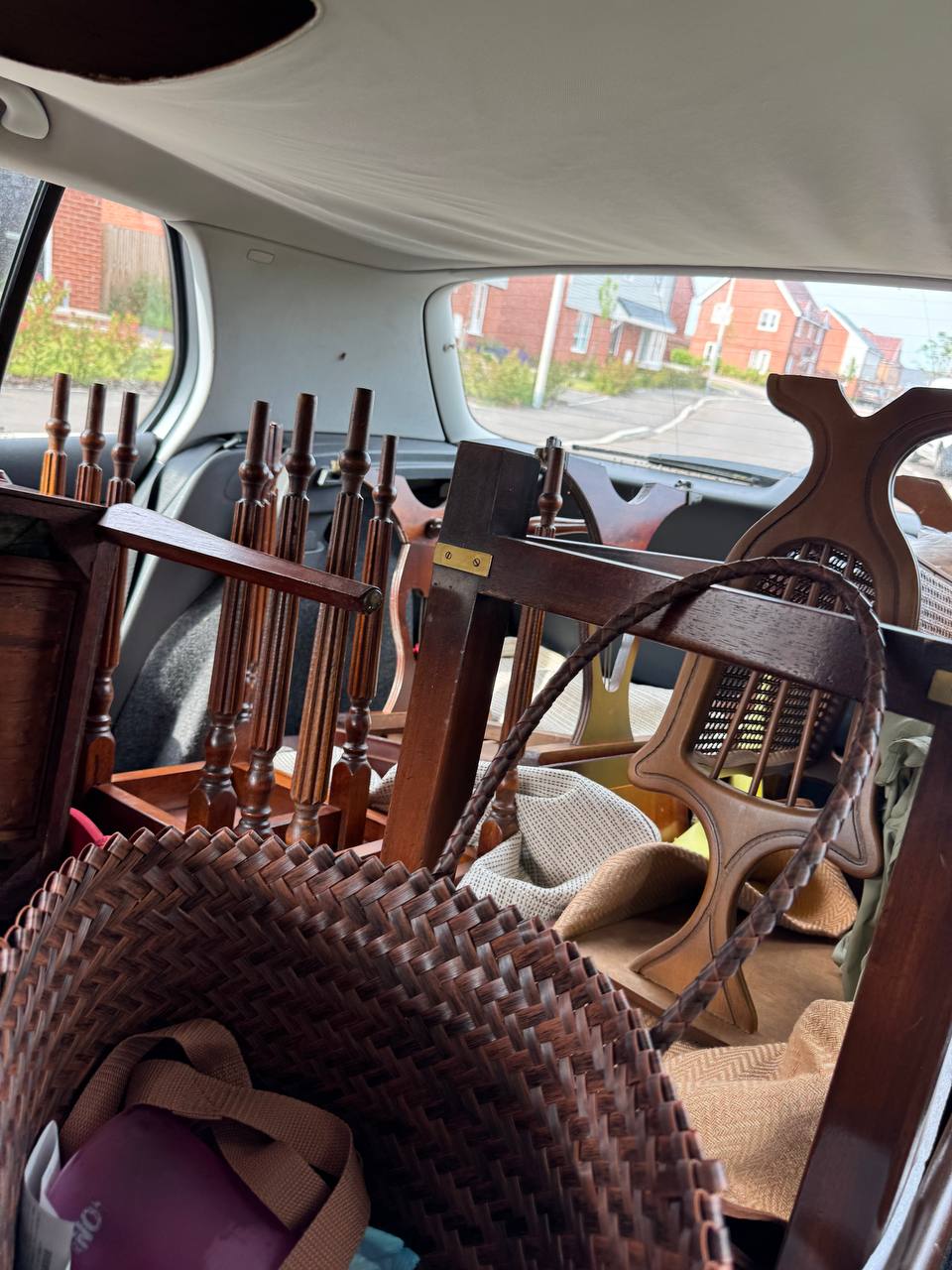 Reseller's car loaded with vintage finds after a France sourcing trip — full to the roof